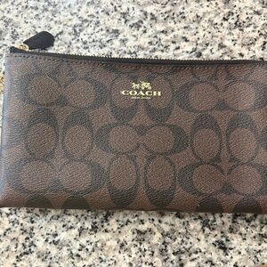 Medium Black and Brown Coach Clutch